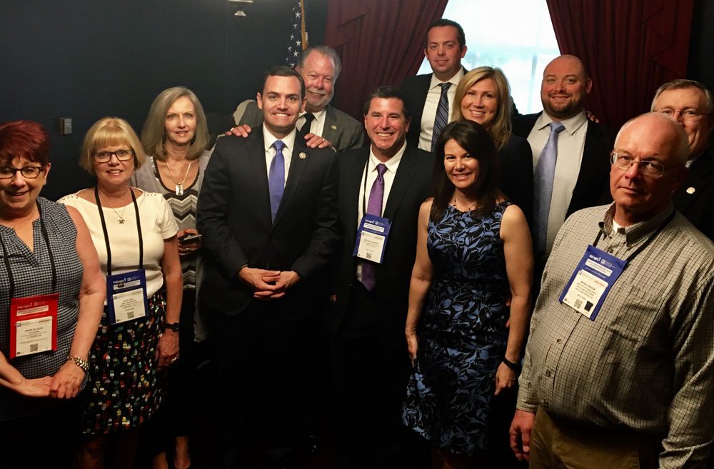 Congressman Mike Gallagher poses for a photo with members from Wisconsin