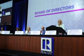 2022 REALTORS® Legislative Meetings Board of Directors meeting Leadership Team at dais