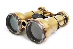 old binoculars facing left