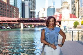 Michelle Mills Clement, RCE, CAE posing by Chicago River