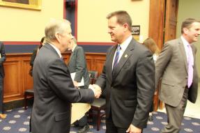 Mike McGrew shaking hands with Rep. Tim Walberg (R-MI)