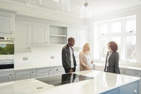 Agents and clients in kitchen