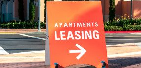 apartment leasing board sign