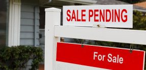 "sale pending" topper on real estate sign