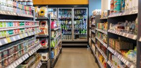 Grocery store aisles with a variety of products