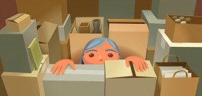Person peeking out of boxes