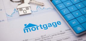 Mortgage applicatio with calculator and key