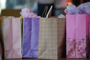 Brightly colored paper shopping bags