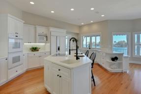 White cabinets with kitchen island