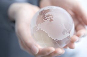 Frosted glass globe in hands
