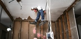 Legs dangling through ceiling; home inspection accident