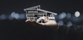 virtual rendering of house in palm of hand