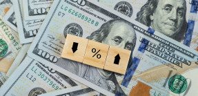 Arrow and percentage sign blocks on cash
