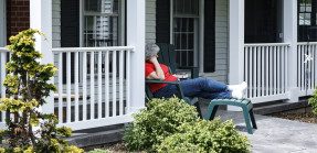Senior snoozing on porch