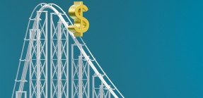 Dollar sign on roller coaster