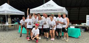 Julie Teets and volunteers at a charity run for Katie's Comfort House