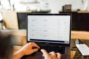 Laptop displaying financial information