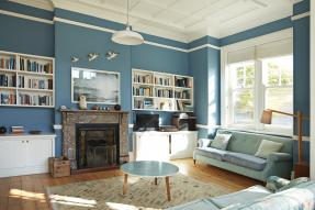 Living room decorated in teal and white