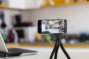 Phone camera on a tripod in a kitchen