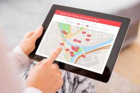 Real estate mapping website on a tablet computer. 