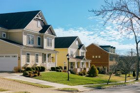 Row of large homes on a suburban street