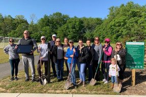 Cape Fear Shiner County Park REALTOR® volunteers with shovels building a storybook trail