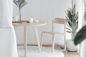 Table, chair, and plants in a home