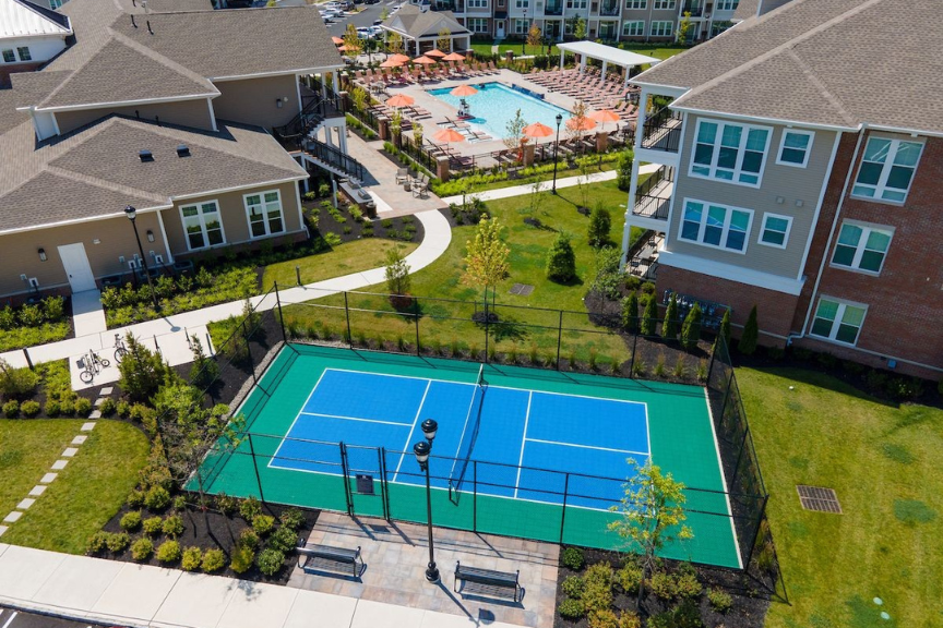 Aerial view of pickleball court in a multifamily complex