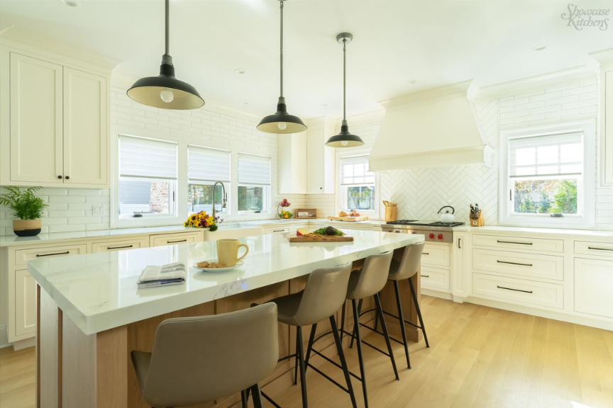 Bright modern kitchen with large island and modern white cabinets