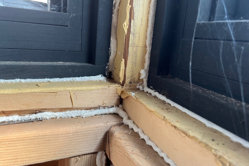 Photo of foam insulation used to keep air from escaping under windows and doors