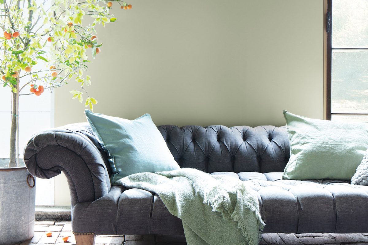 Black Couch With Green Pillows