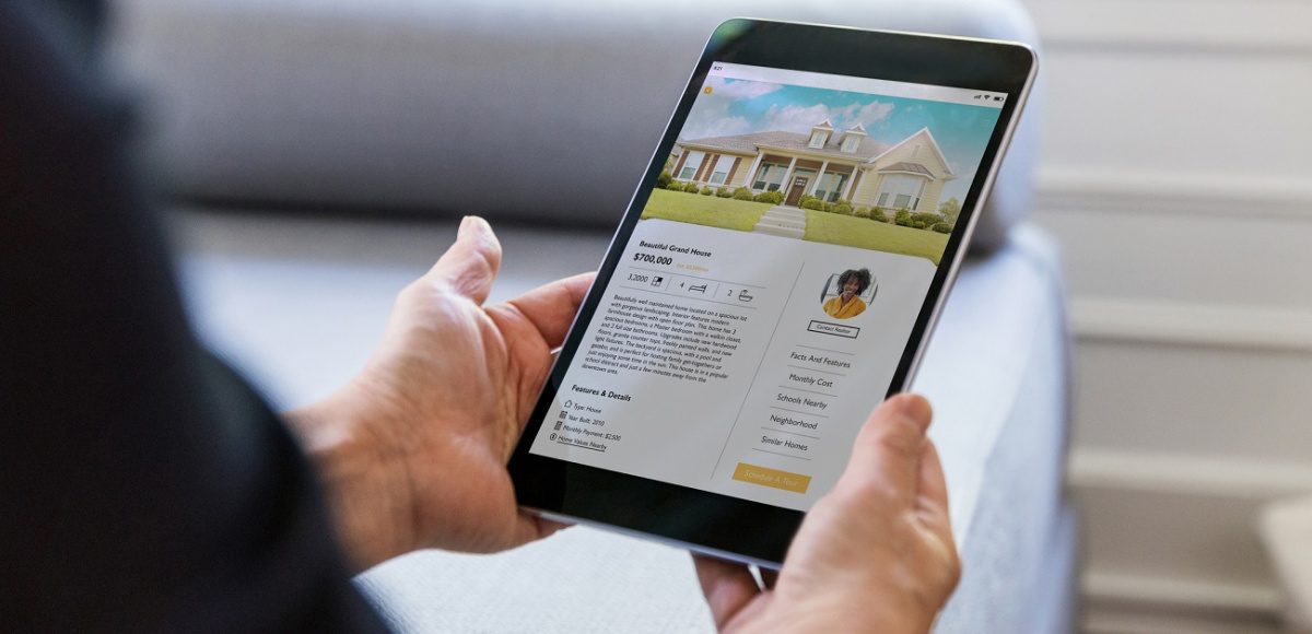 person using real estate mobile app