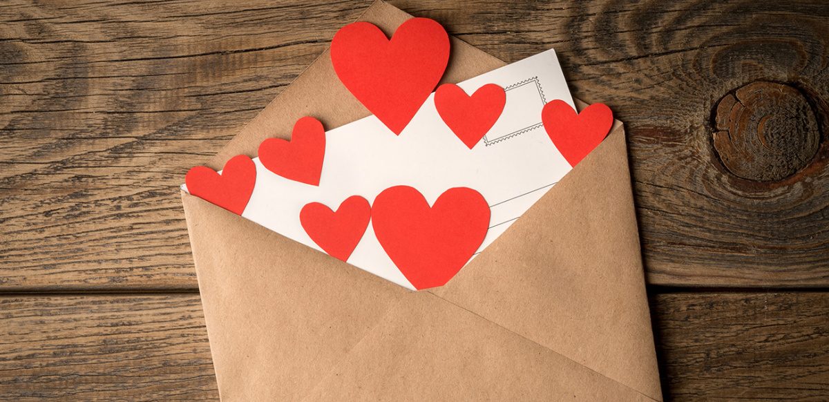 Hearts on letter in envelope