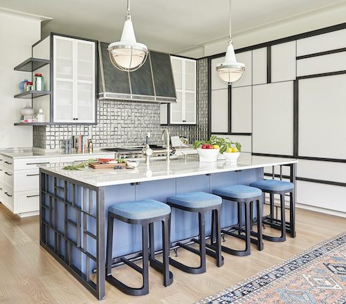 White kitchen with blue island and white countertops