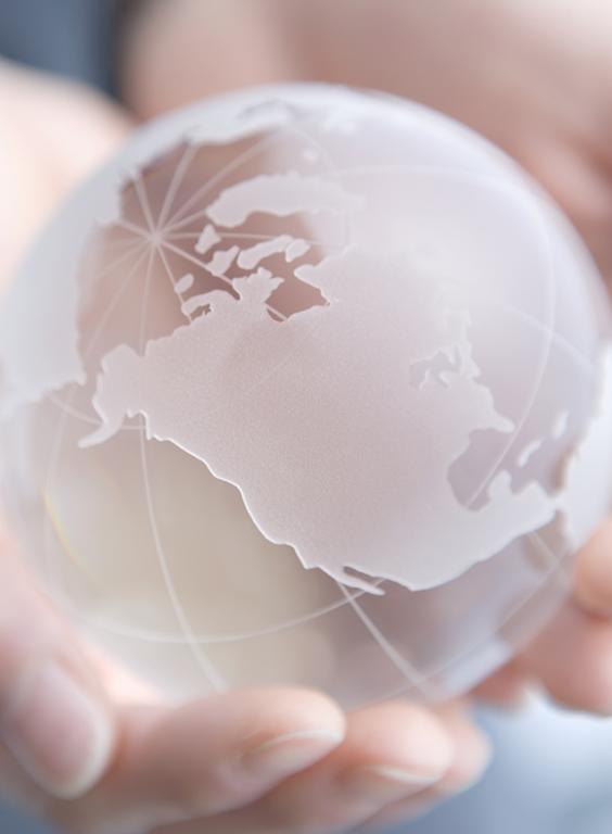 Frosted glass globe in hands