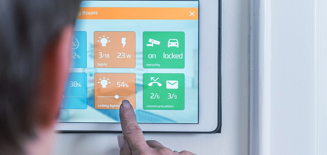 Person using a smart home touchscreen