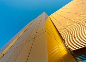 Gold building, blue sky