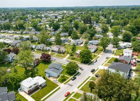 Low aerial shot of suburban neighborhood