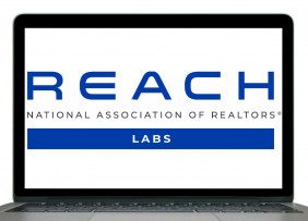 NAR REACH Labs logo on a laptop screen