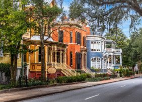 Old homes in the American south and trees with Spanish moss