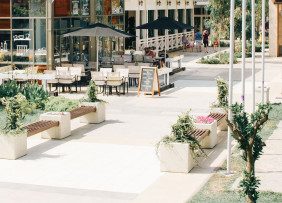 Outdoor plaza with restaurant seating