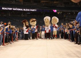 NAR Members cheer for the racing presidents mascots during the REALTOR® National Block Party at Nationals Park.