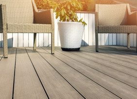 Decking with chairs and plant