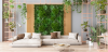 Green Living Room With Vertical Garden, House Plants, Beige Color Sofa And Parquet Floor