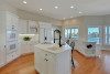 White cabinets with kitchen island
