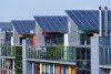 Colorful building with rooftop solar panels