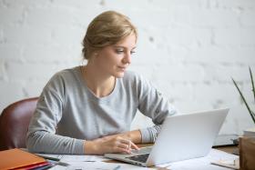 Woman studying at computer